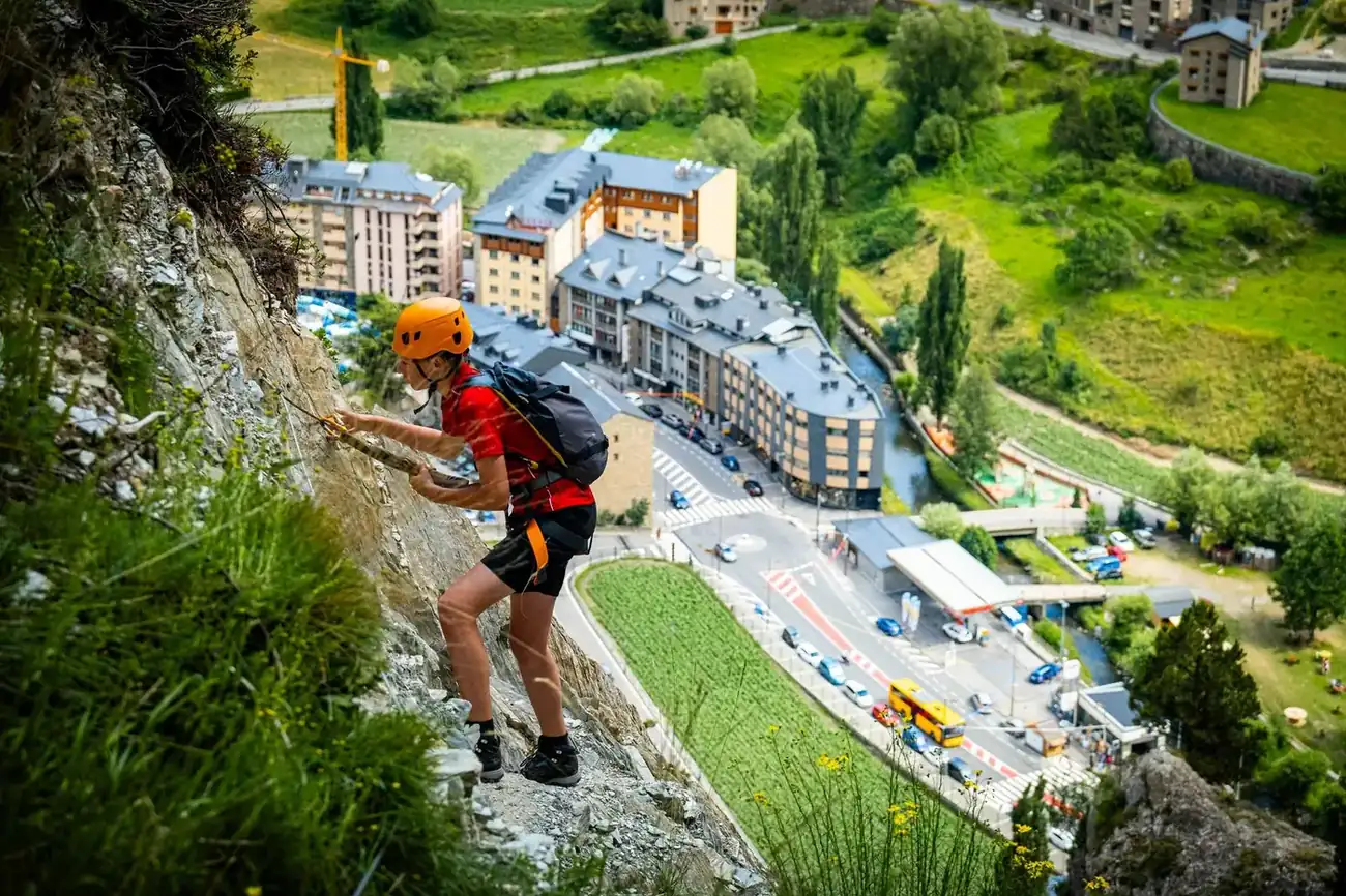 Climber on a via ferrata route above Andorra la Vella